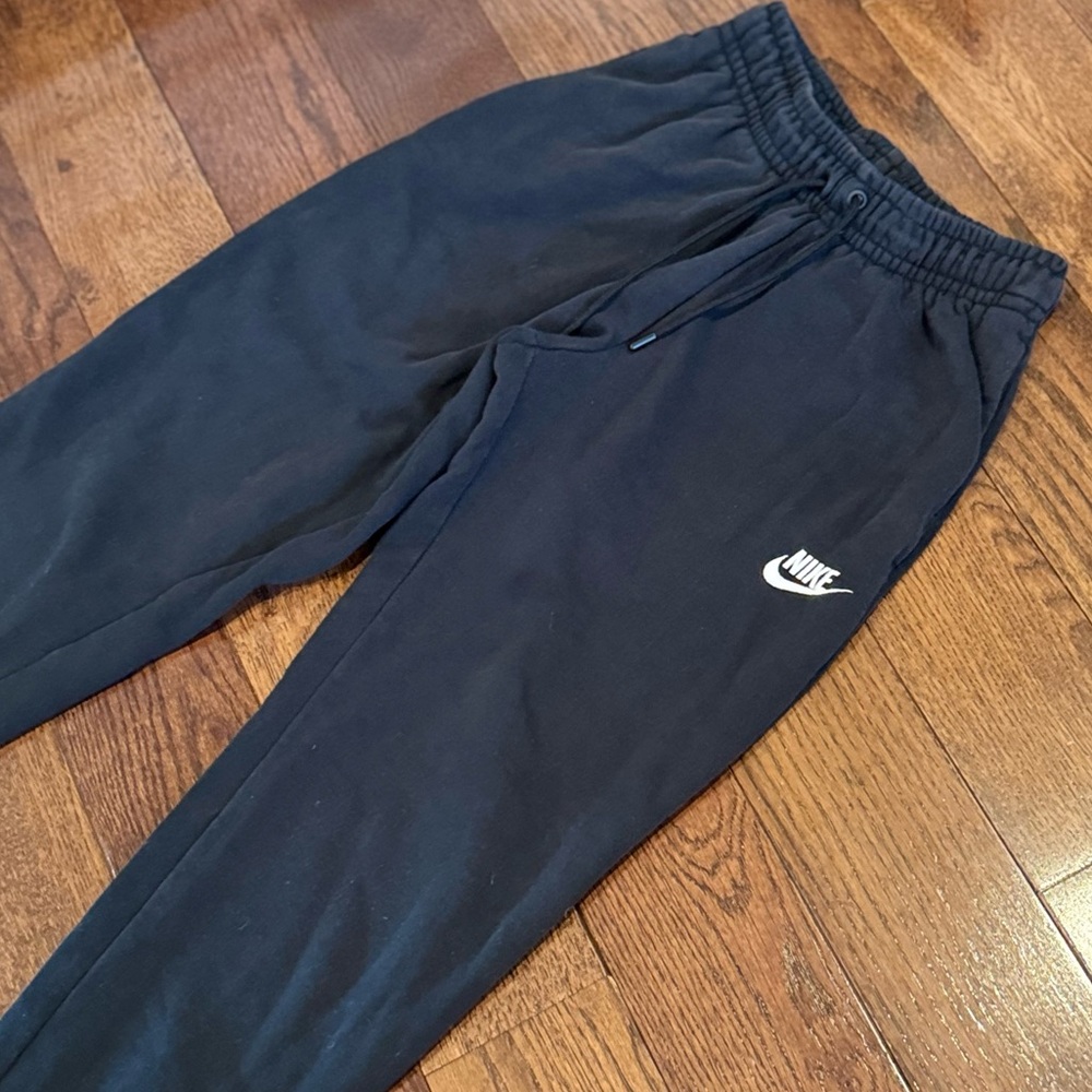 GUC Nike sweatpants. These show signs of wear but have plenty of life left.